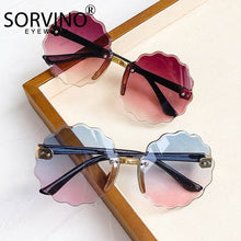 Load image into Gallery viewer, 2021 New Rimless Children Sunglasses uv400 Frameless Ocean Color Plum Shaped Fashion Round Cute Baby Vintage Cut-edge Glasses
