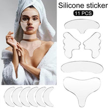 Load image into Gallery viewer, 2/11/16/18pcs Reusable Silicone Removal Sticker Face Forehead Neck Eye Sticker Pad Anti Aging Skin Lifting Care
